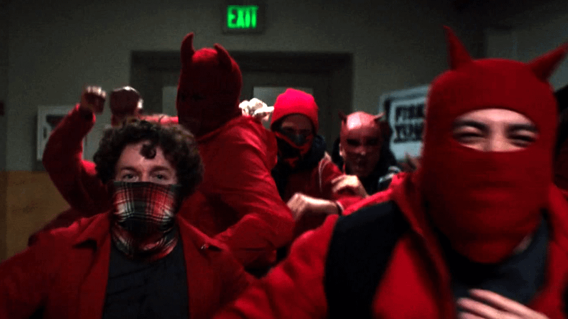 Crowd wearing red masks riot in Daredevil Born Again Season 2 finale.