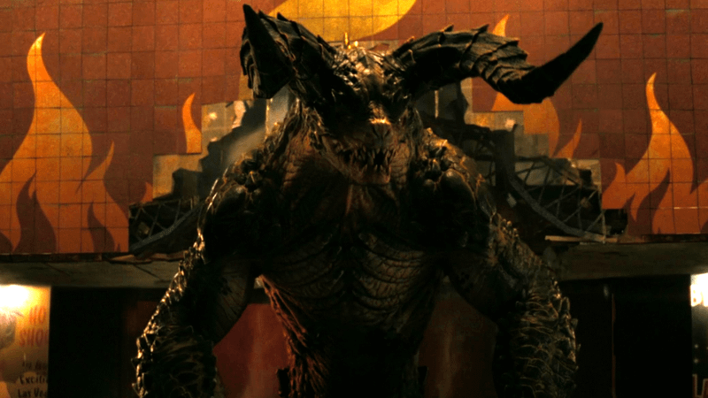 An upright Deathclaw on a city street in Fallout