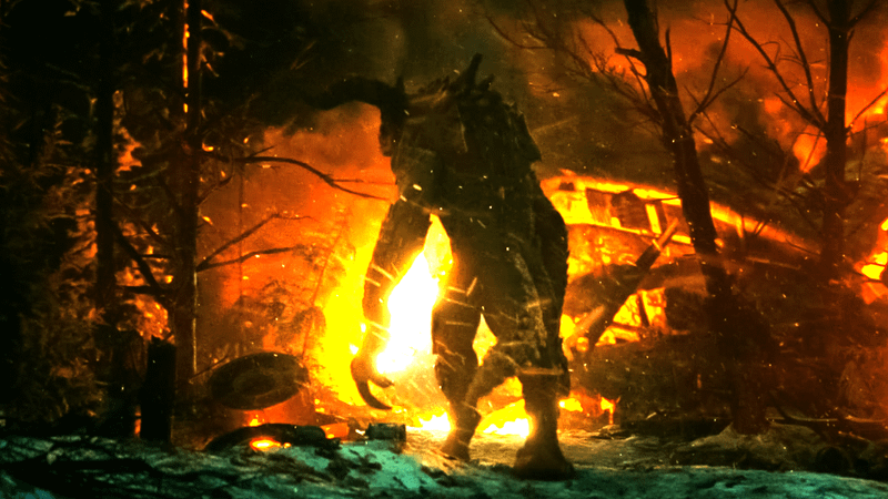 Deathclaw standing by a crashed ship in Fallout