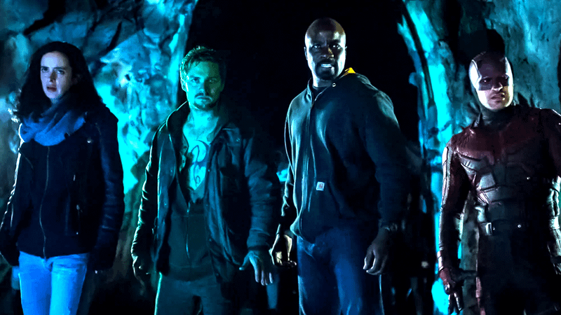 Krysten Ritter as Jessica Jones, Finn Jones as Iron Fist, Mike Colter as Luke Cage, and Charlie Cox as Daredevil in 'The Defenders.'