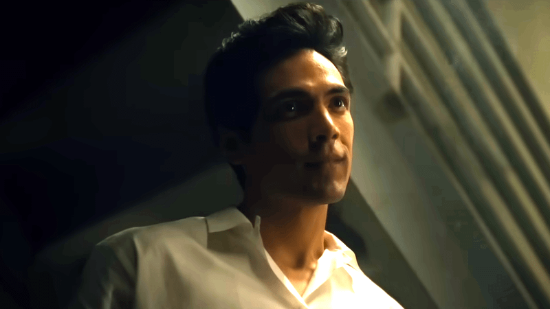 Diego Calva wearing a white button-up shirt