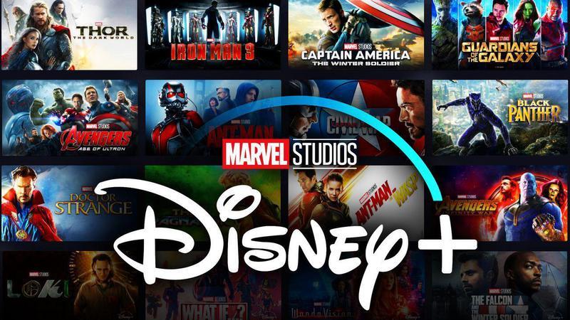 The Disney+ logo with several Marvel Studios titles in the background behind it.