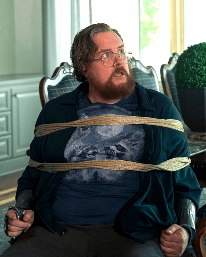 Steve Agee as John Economos in Peacemaker Season 2, Episode 7