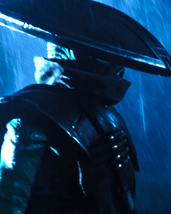 Embo standing in the rain in The Mandalorian & Grogu.