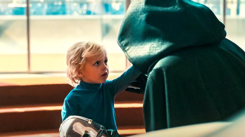 Franklin Richards touching Doctor Doom's face in the mid-credits scene of Fantastic Four: First Steps.