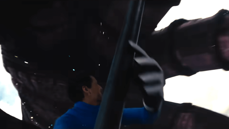 Galactus holding out his hand and trying to grab Mr. Fantastic in Fantastic Four: First Steps