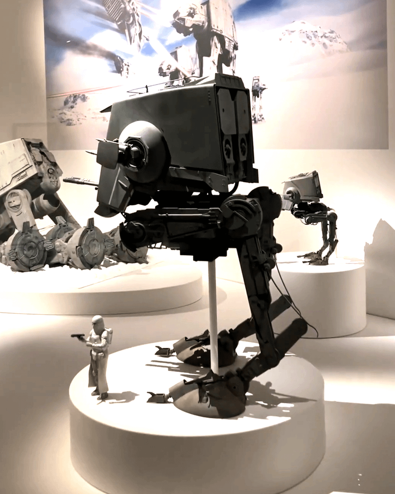 model of black AT-ST Walker from 'Star Wars: Episode V — The Empire Strikes Back.'