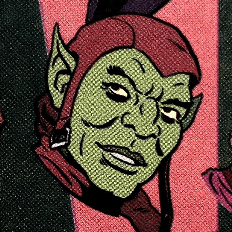 Green Goblin with sickly green skin, pointed ears.
