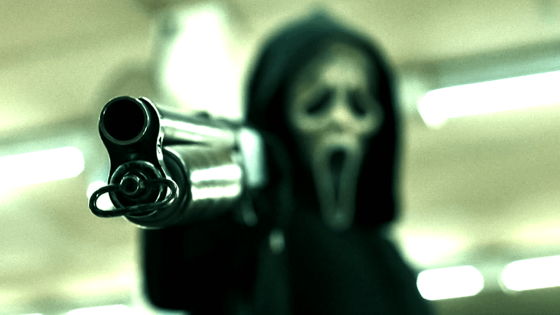 Ghostface with a gun in Scream 6.