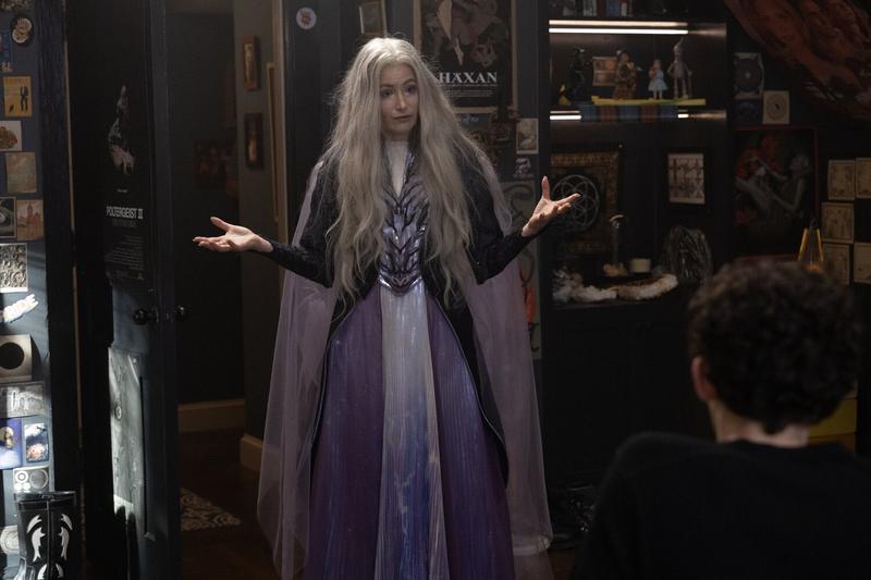 Kathryn Hahn as Agatha in a purple dress in Agatha All Along
