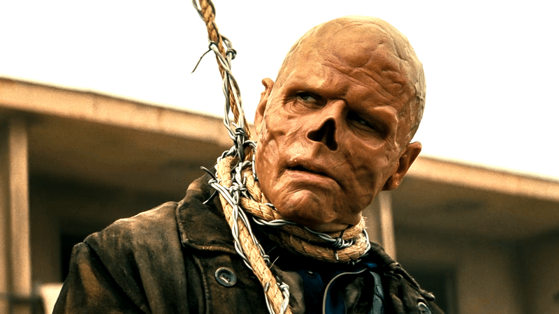 Walton Goggins as Ghoul looking off to the side with a noose around his neck in Fallout