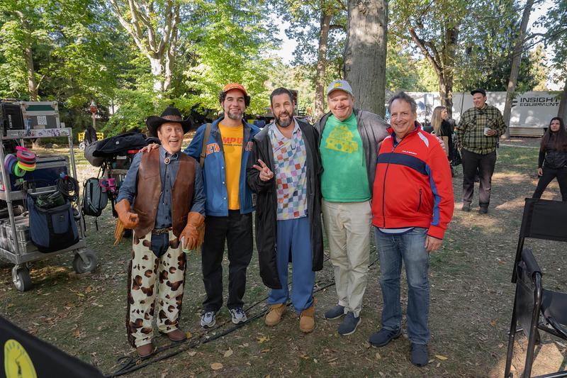 Several ast members from Happy Gilmore 2 standing together on the set