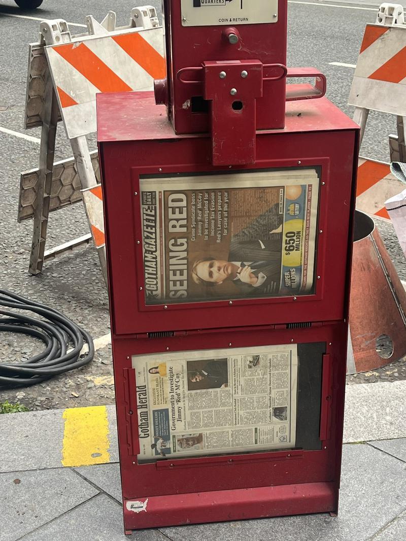 red newspaper dispenser on Clayface set