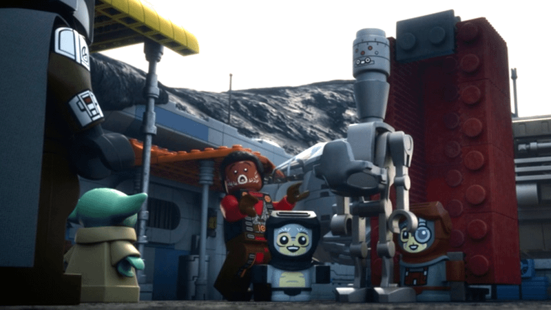 Grogu looking at Greef Karga, the Anzellans, and IG-12 in LEGO Star Wars: The Mandalorian.