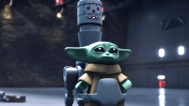 Grogu sitting in IG-12's seat in LEGO Star Wars: The Mandalorian.
