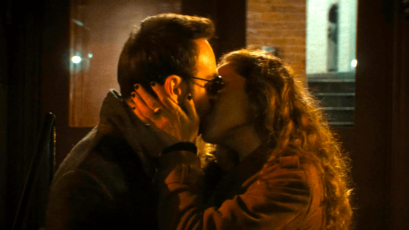 Matt Murdock kisses Heather Glenn in Daredevil Born Again Season 1.