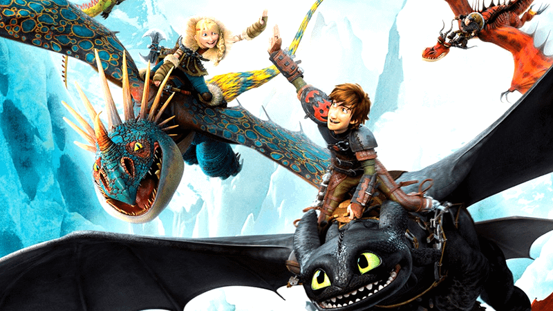 Astrid and Hiccup on dragons from the original trilogy.