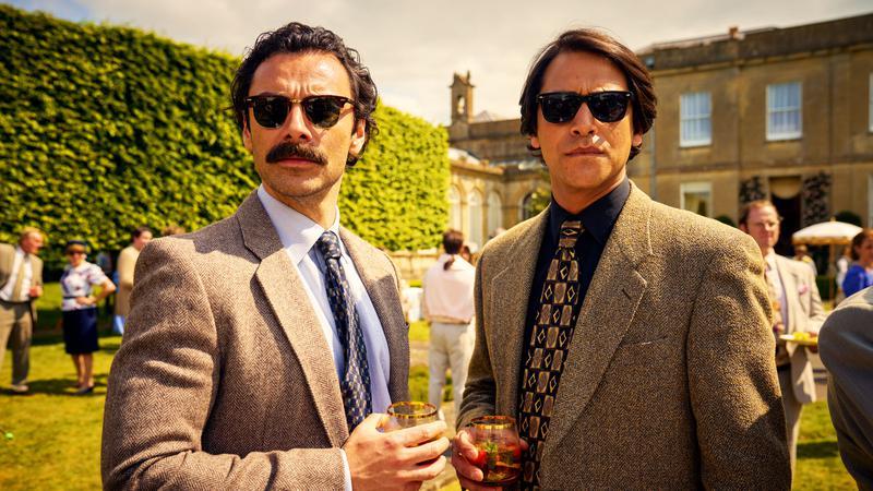 Aidan Turner and Luke Pasqualino in the Hulu series Rivals.