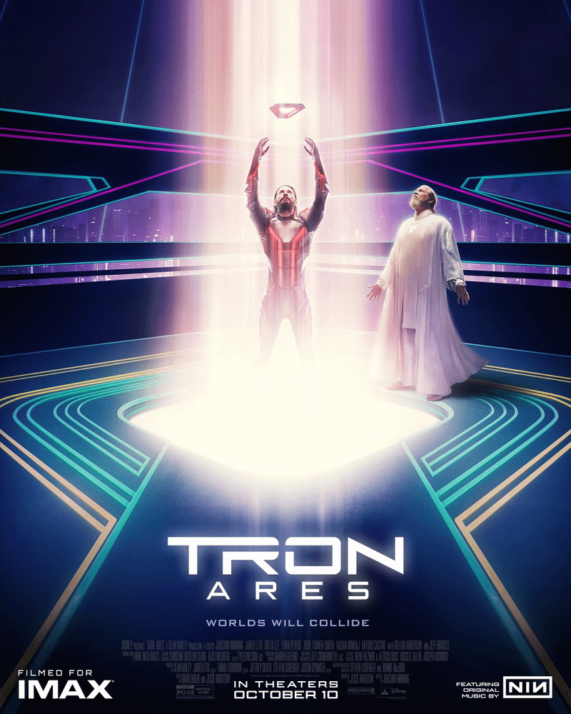 Jared Leto as Ares holding a Data Disk to the sky in Tron: Ares