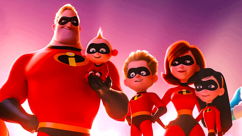 The Incredibles heroes in costume standing together.
