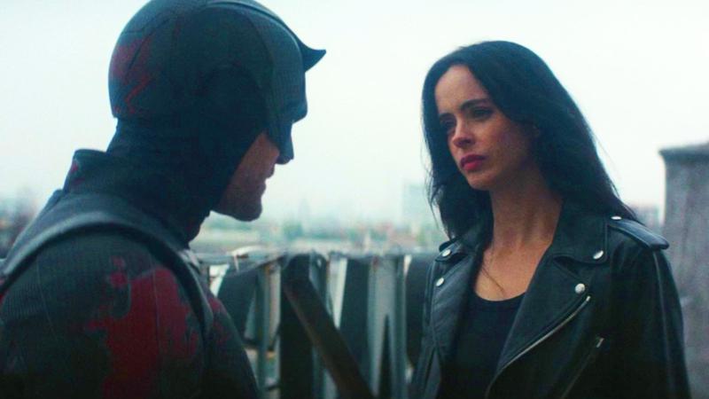 Krysten Ritter as Jessica Jones and Charlie Cox as Daredevil in Daredevil: Born Again Season 2.