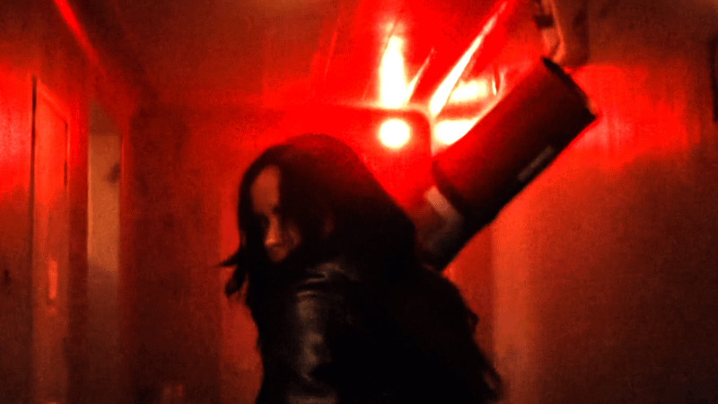 Jessica Jones taking down agents.