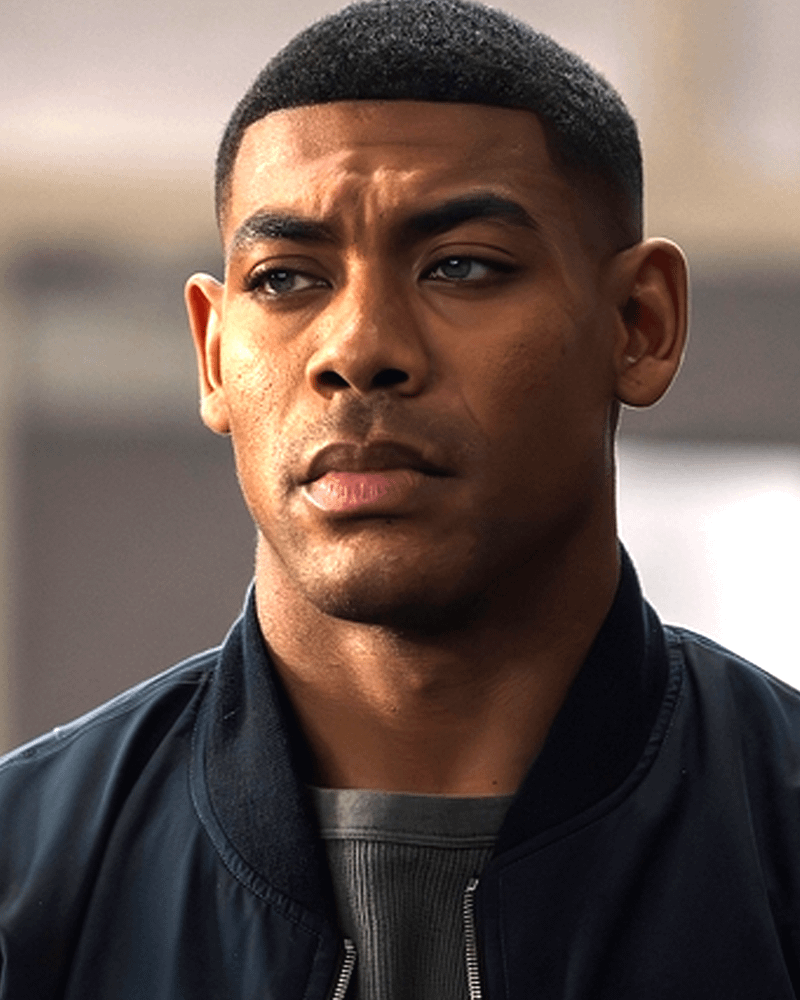 A clean shaven Aaron Pierre as John Stewart.