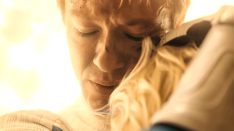 Johnny Storm hugging Sue Storm.