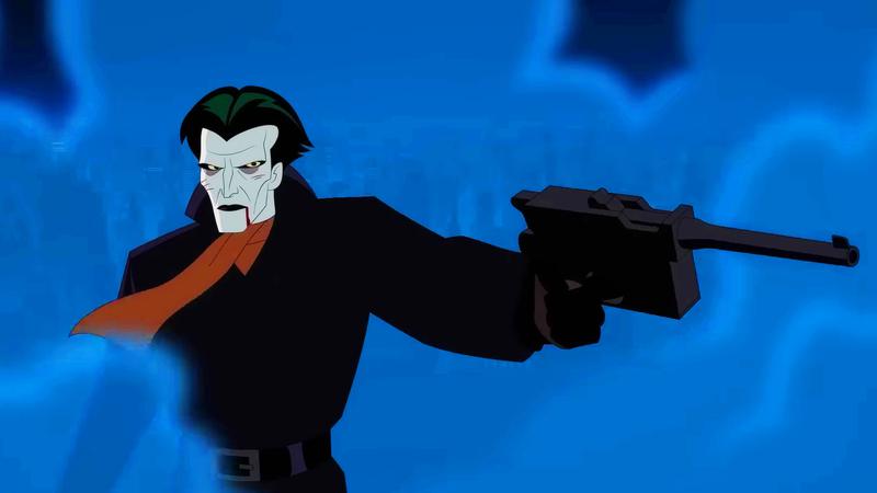 Joker points a gun at Batman in a rage.