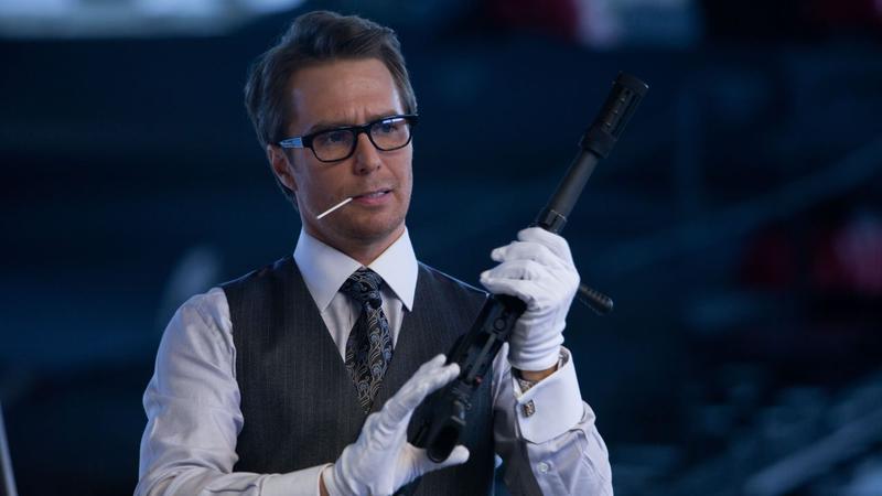 Justin Hammer holding a gun in Iron Man 2.
