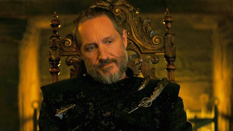 Baelor Targaryen sitting in a chair and looking disappointed in A Knight of the Seven Kingdoms.