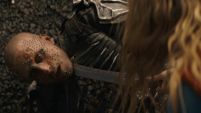 Kara stabbing Krem in the neck in Supergirl.