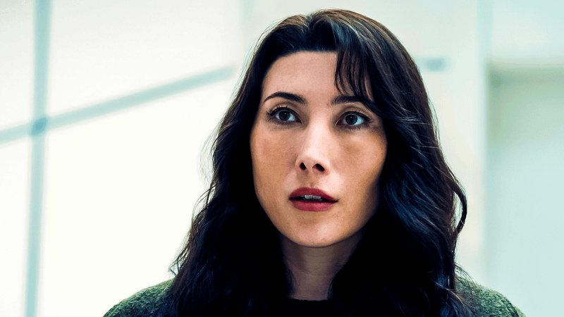 Dichen Lachman as Ms. Casey looking shocked in Severance