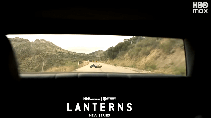 Kyle Chandler as Hla Jordan laying on a road in Lanterns.