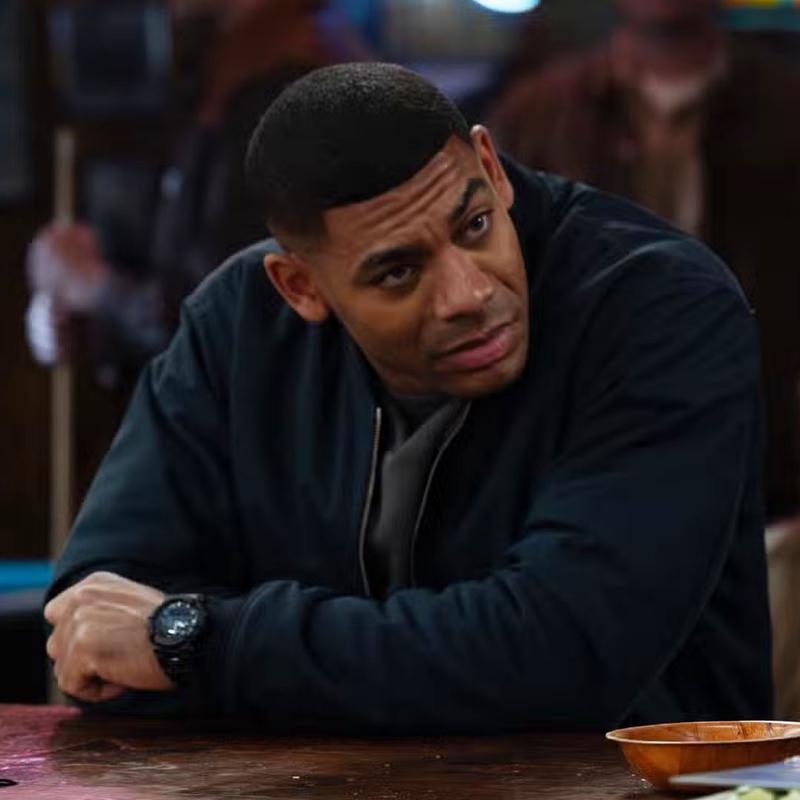 Aaron Pierre John Stewart in bar close up in Lanterns.