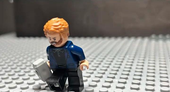 LEGO minifig of Steve Rogers holding Mjolnir in recreated 'Avengers: Doomsday' trailer.