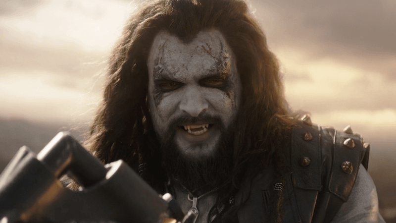 Lobo smiling down at Kara at the end of Supergirl.