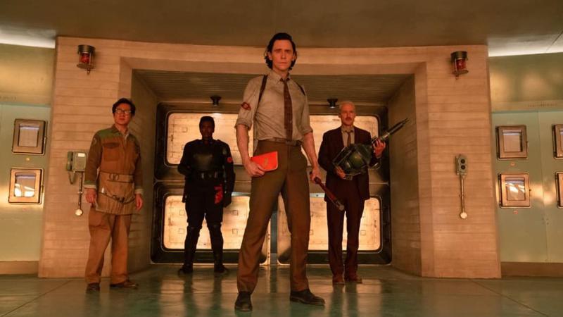Loki and his friends looking in front of them in the Disney+ series.