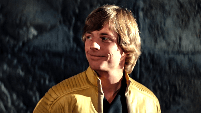 Mark Hamill as Luke Skywalker in a yellow leather jacket in Star Wars
