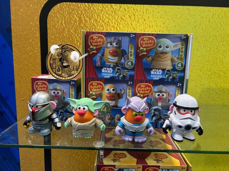 A display of four new Mr. Potato Head toy sets, featuring Mr. Potato Head dressed as Din Djarin, Grogu, Zeb Orrelios, and a Stormtrooper from The Mandalorian and Grogu.