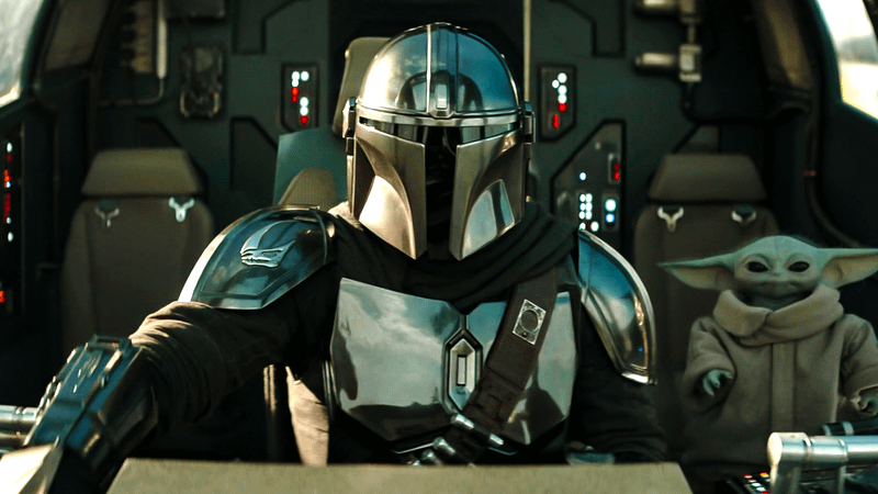 Mandalorian and Grogu in Razorcrest.