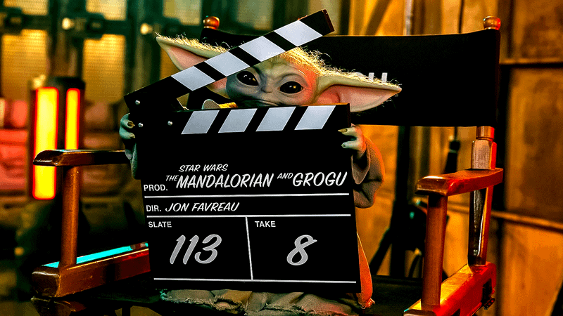 Grogu holding a clapboard in Empire Magazine shot.