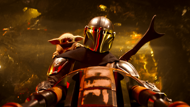 The Mandalorian Din Djarin with Grogu on his shoulder.