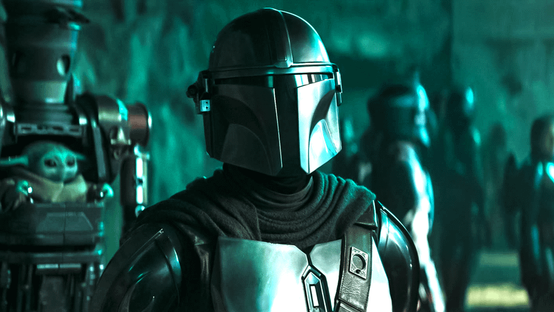 The Mandalorian and Grogu in the background.