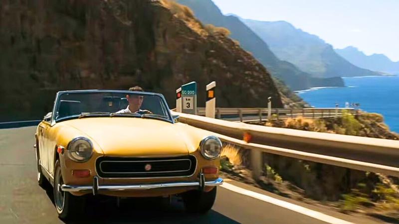 Manousos driving in Pluribus Episode 7