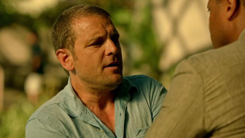 Mark Shaw being confronted by John Diggle in Arrow.