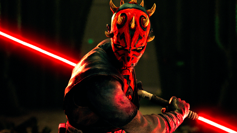 Darth Maul posing with his lightsaber lit at his hip in Maul: Shadow Lord