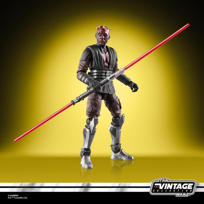 A Darth Maul figure with his light saber out in front of his body