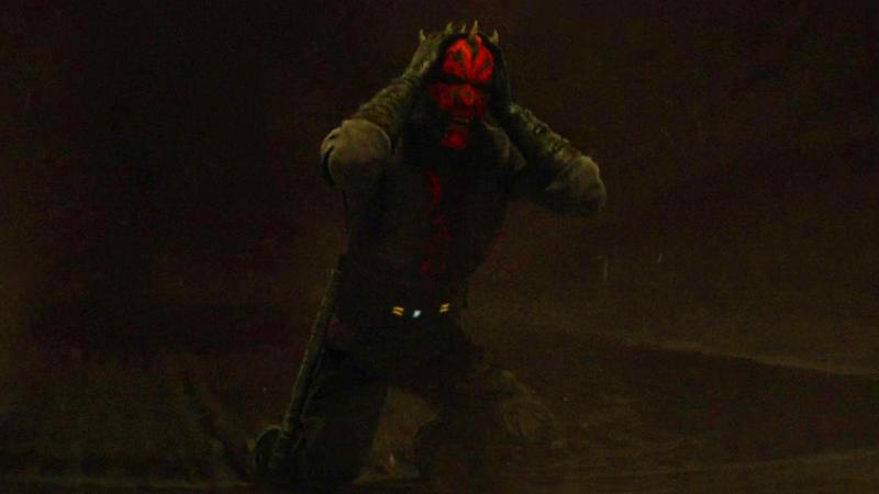 Maul holding his head in Maul - Shadow Lord.