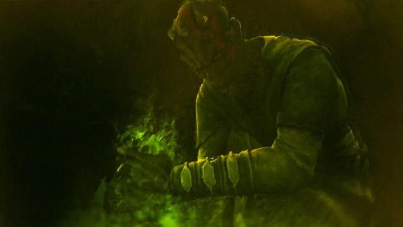Maul grabbing Savage Opress' hand in Maul's memory.